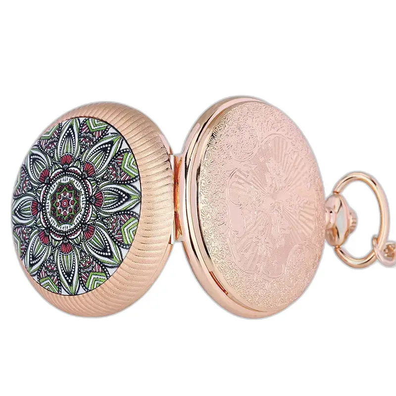 Quartz Luxe öppet fickur i roséguld med smaragdstenar på skivspelare